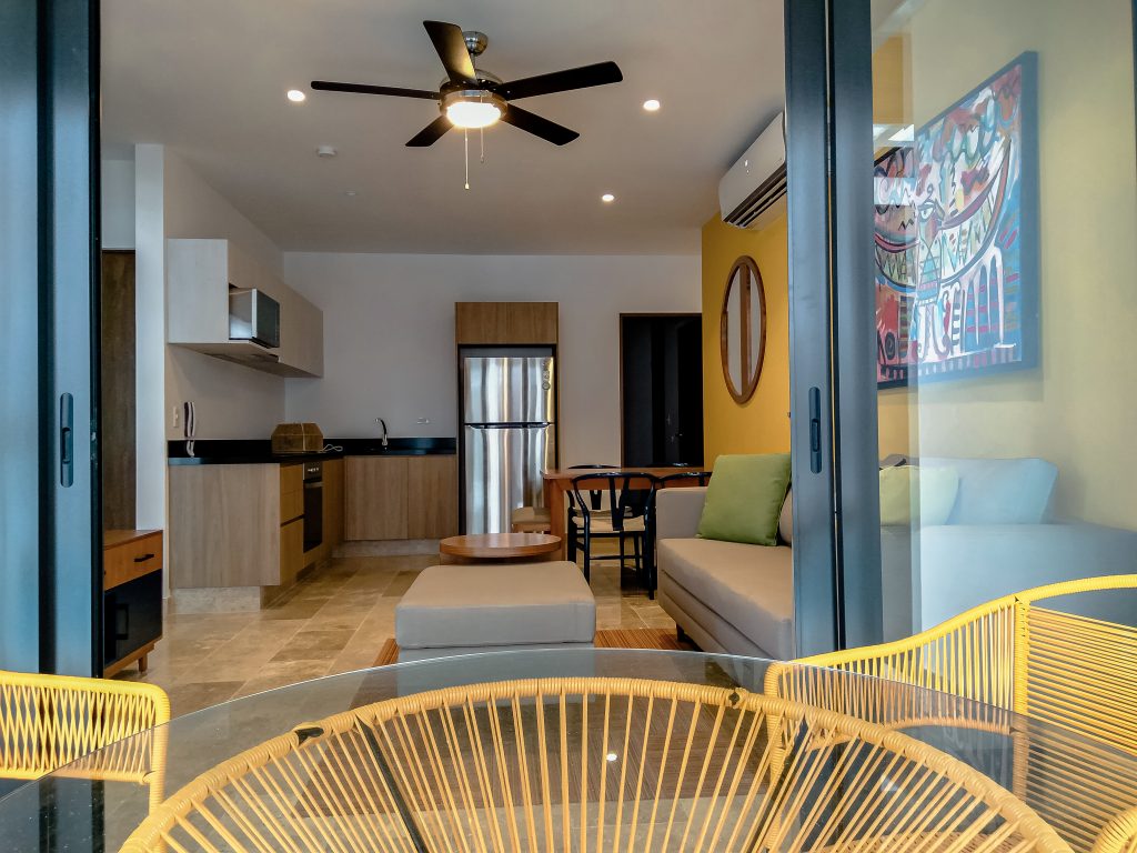 Kitchen furnished by Homiture — rental-ready unit in the Riviera Maya