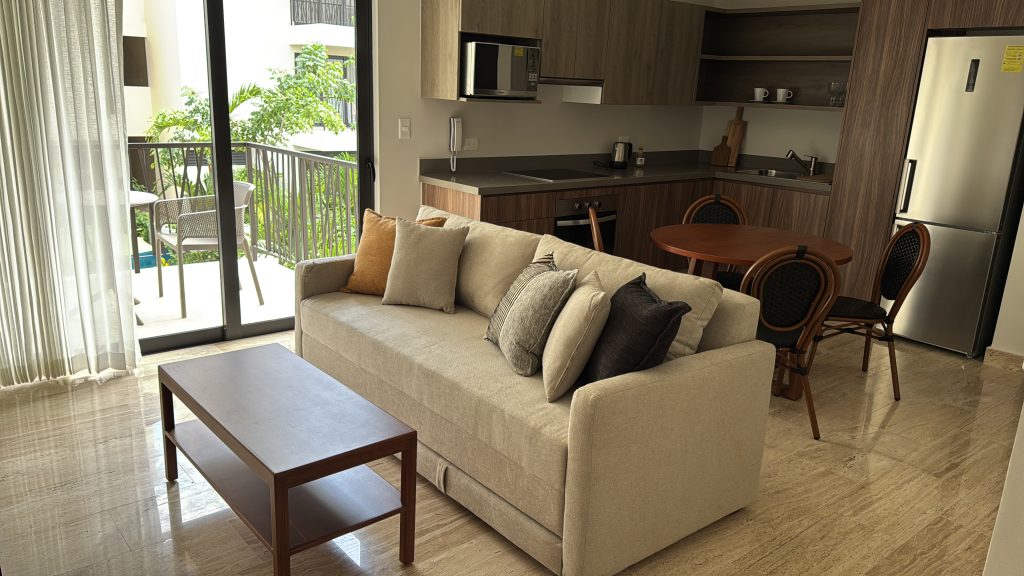 Kitchen furnished by Homiture — rental-ready unit in the Riviera Maya