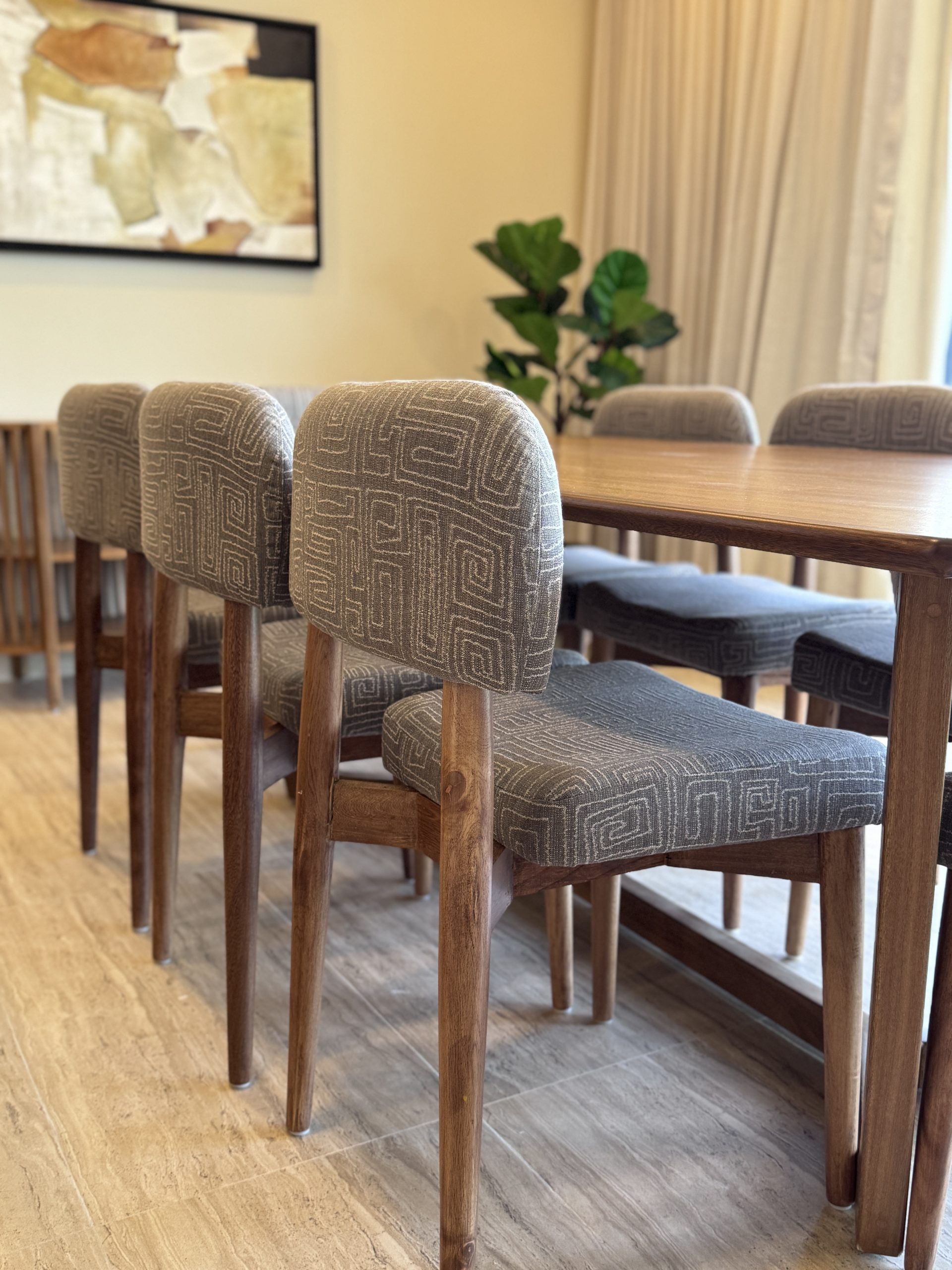 Dining room furnished by Homiture — rental-ready unit in the Riviera Maya