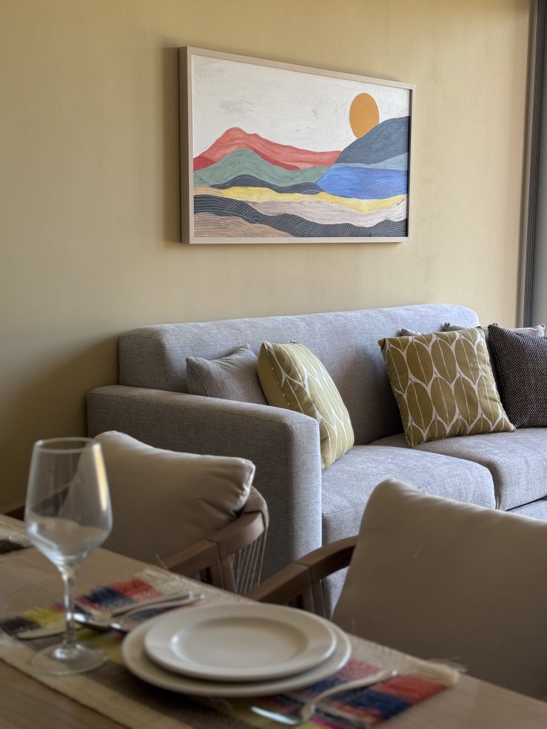 Dining room furnished by Homiture — rental-ready unit in the Riviera Maya