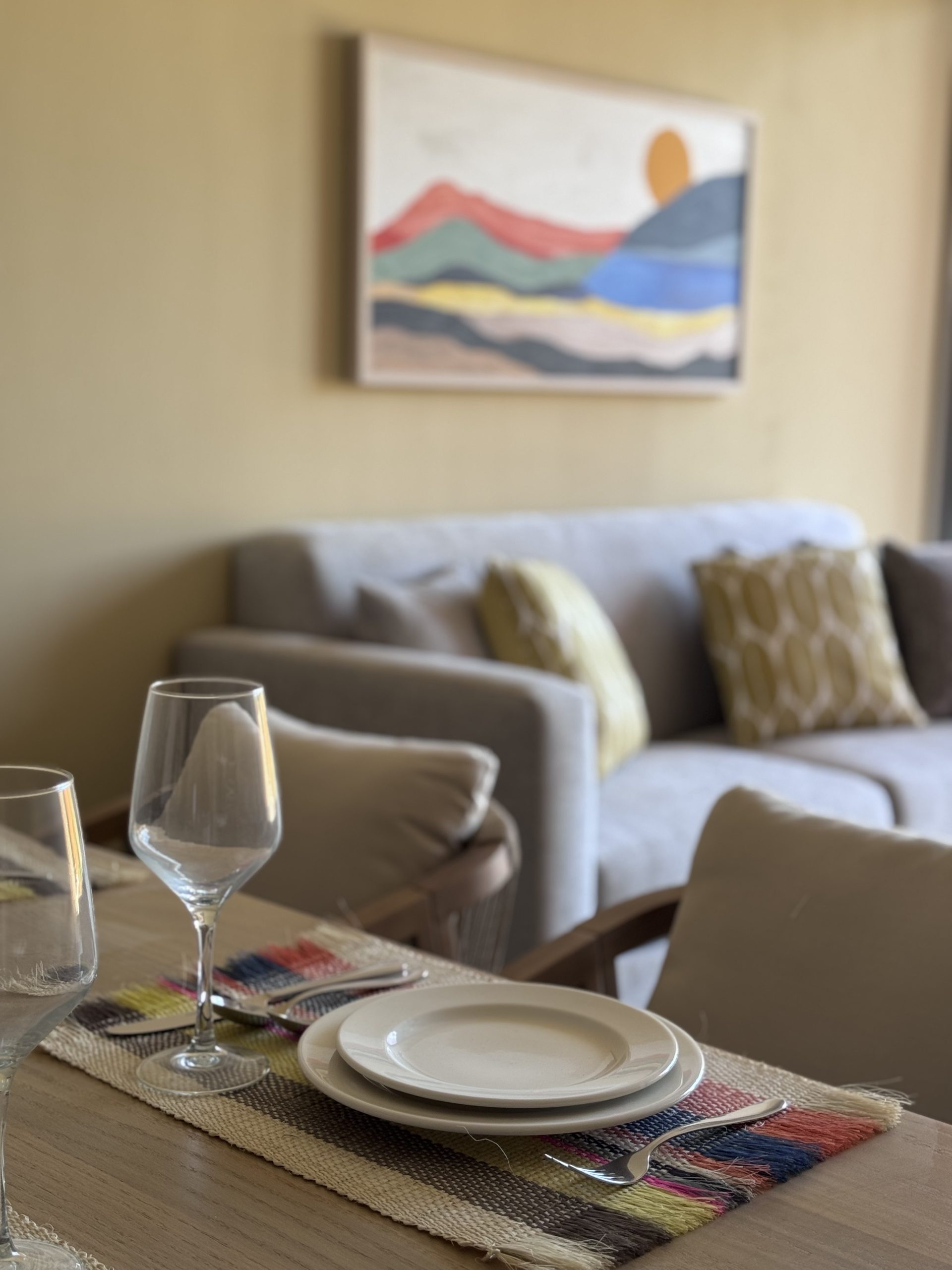 Dining room furnished by Homiture — rental-ready unit in the Riviera Maya