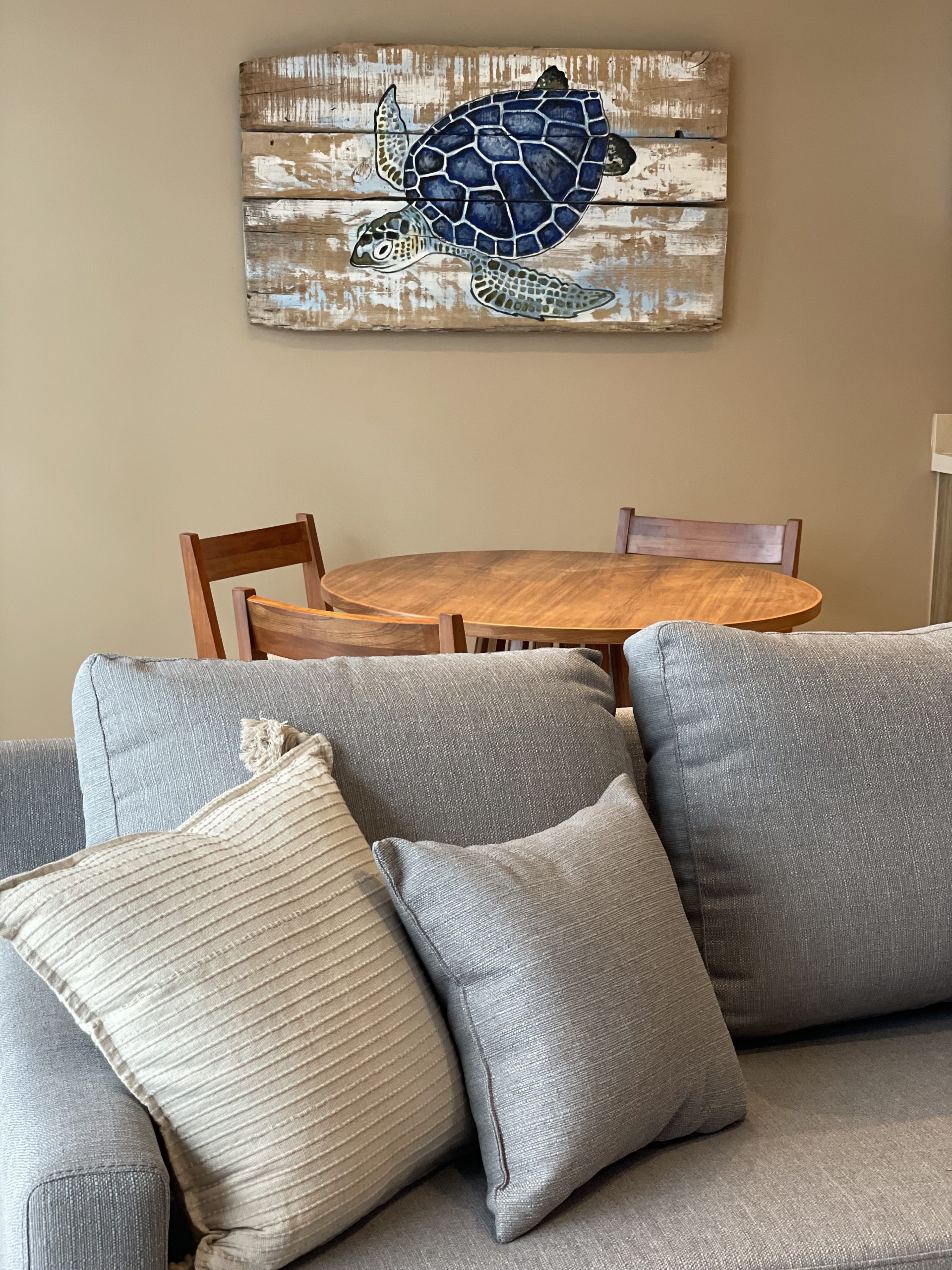 Living room furnished by Homiture — rental-ready unit in the Riviera Maya