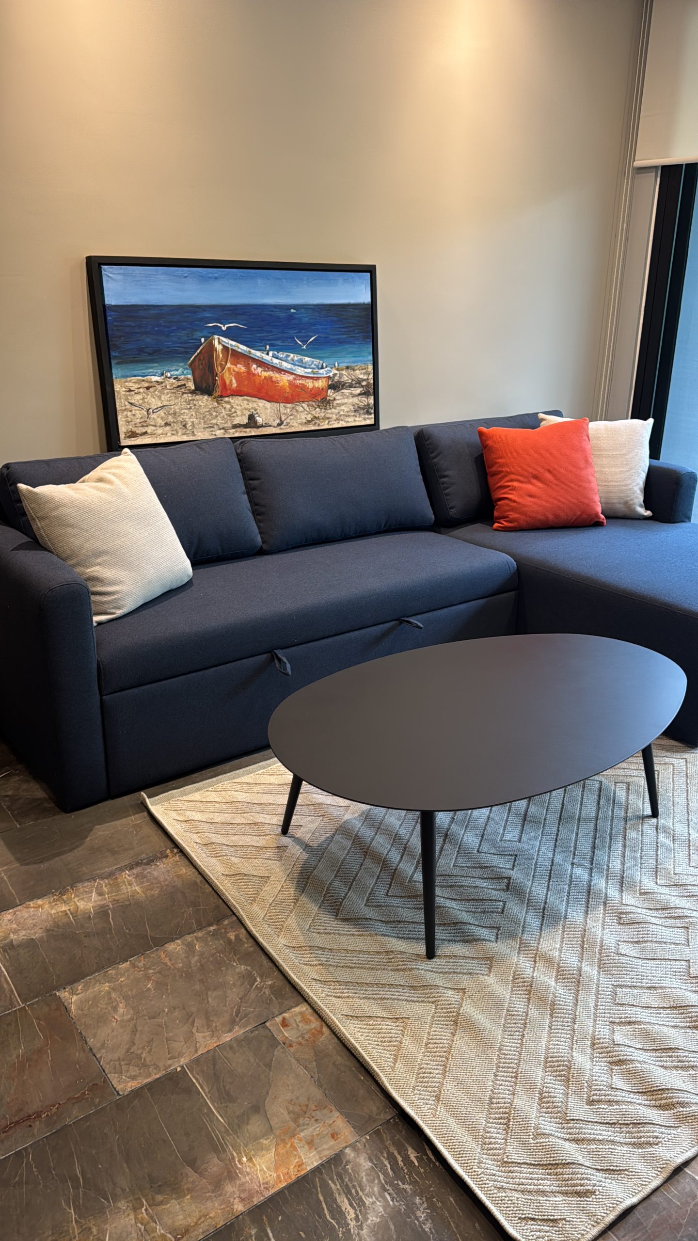Living room furnished by Homiture — rental-ready unit in the Riviera Maya