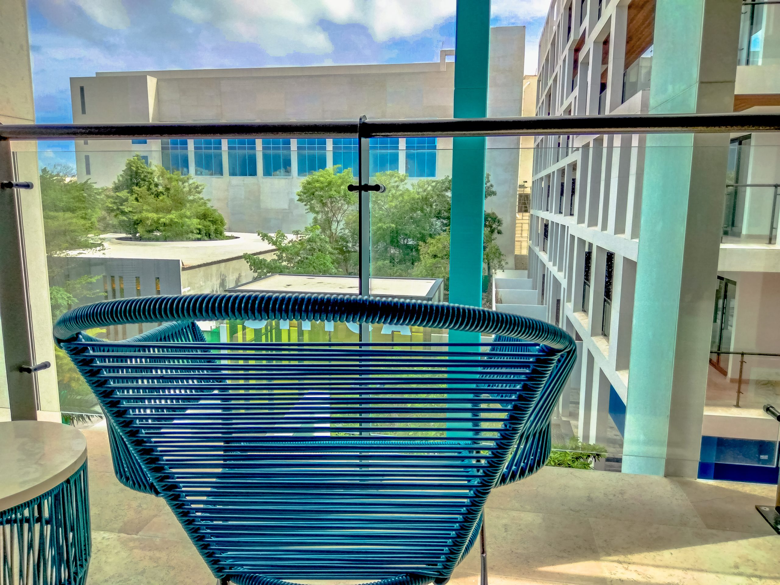 Terrace furnished by Homiture — rental-ready unit in the Riviera Maya